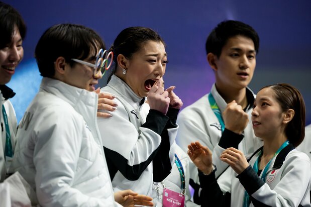 Team Japan celebrating the figure skating team event results at the Milano Cortina Winter Olympics on February 8, 2026. (© Zuma Press Wire/Reuters)