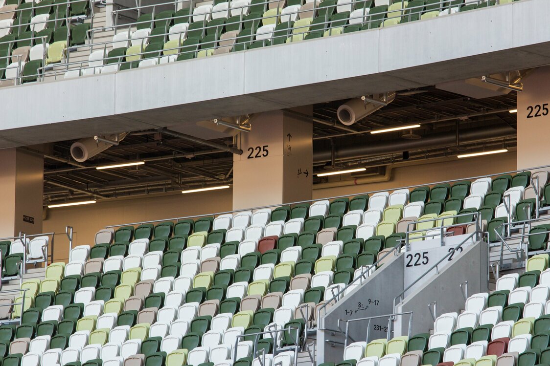 Fans keep spectators cool while creating an updraft over the track and field.
