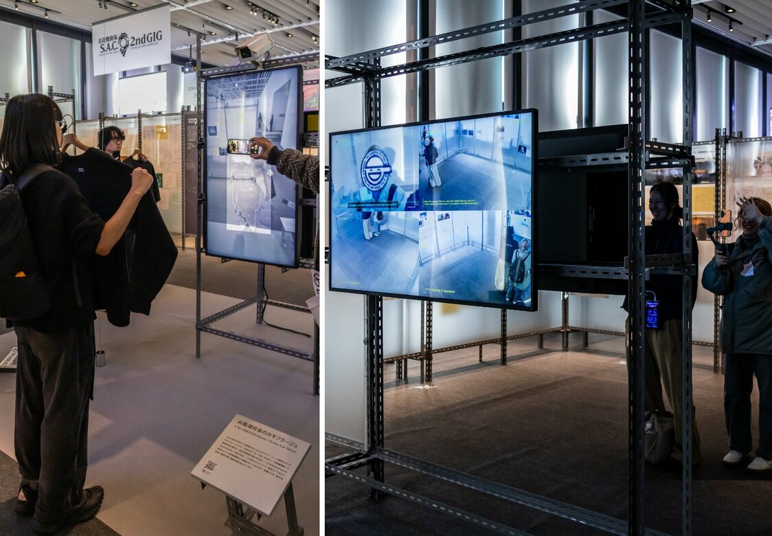 Interactive content inspired by future technologies depicted in the anime, such as special T-shirts that evade recognition by AI surveillance cameras or experiences where one’s face is hacked into the Laughing Man. (© Nippon.com)