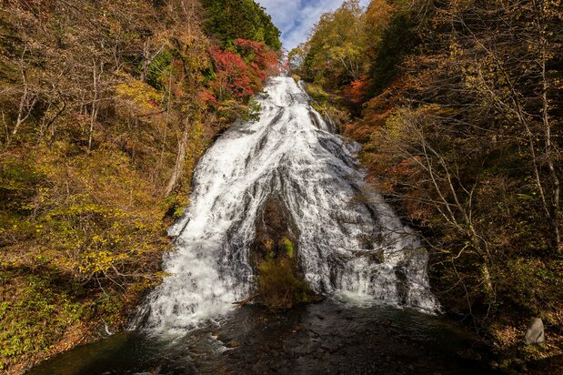 Yutaki, photographed from a lookout platform. The waterfall splits into two streams near the bottom.