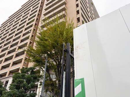 A data center construction site adjacent to a residential building in Koto Ward, Tokyo, photographed Oct. 2