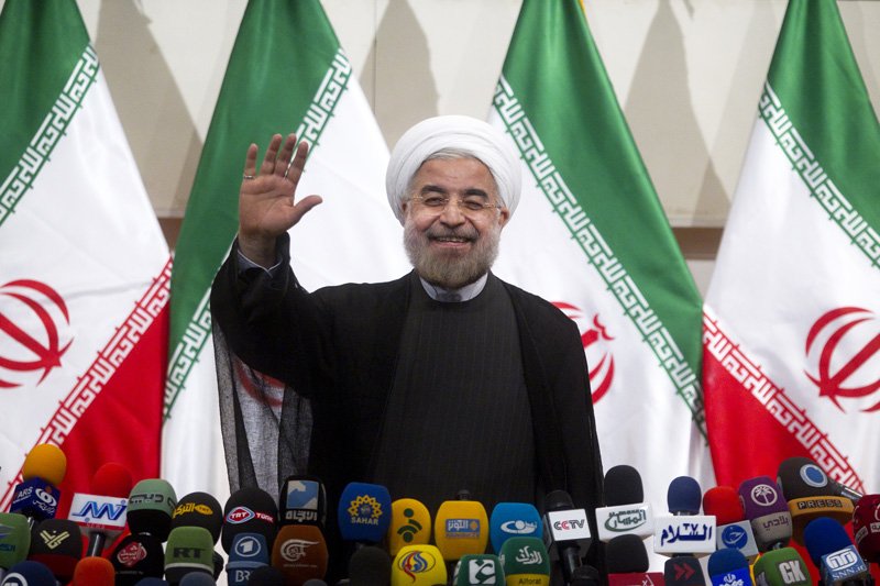 イラン次期大統領ロウハニ氏が記者会見で抱負を語った。（写真=アフロ）