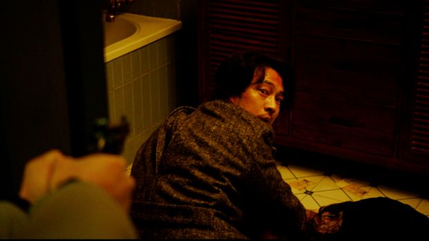 ホテルで起こった密室殺人事件からすべては始まる ©2022 LOTTE ENTERTAINMENT & REALIES PICTURES All Rights Reserved.