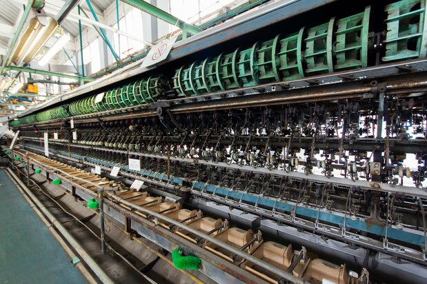 Automated reeling machines, which first appeared in the 1930s, greatly reduced the number of workers needed for operations. 