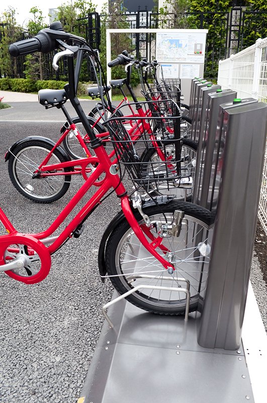 Bicycles for hire on a city street.