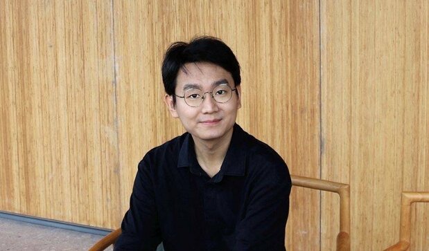グー・シャオガン監督