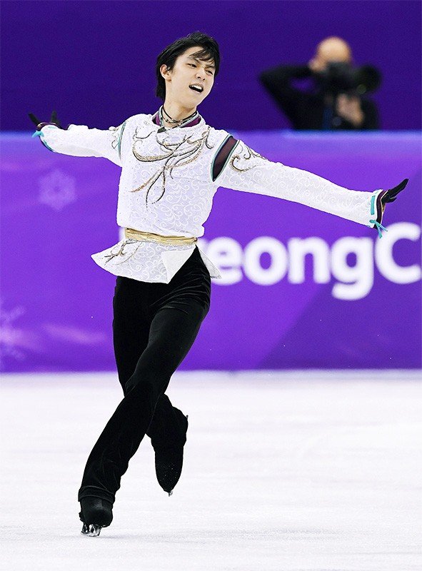羽生结弦在平昌冬奥会花滑男单自由滑项目中一展风采，2018年2月17日，韩国江陵（时事社）