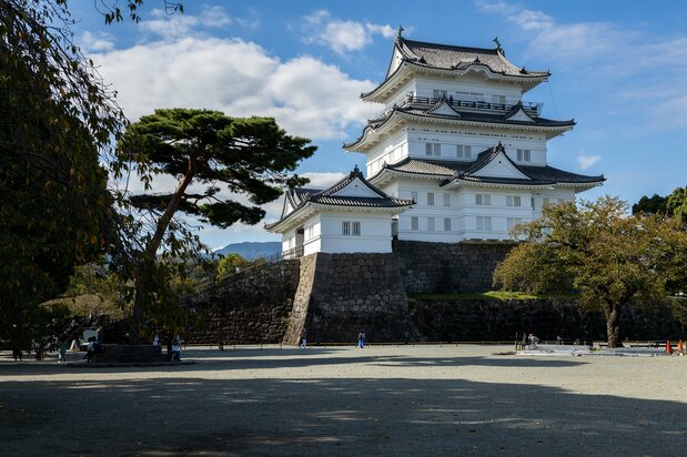 The central keep, rising beyond the main compound, gleams after major renovations in 2016.