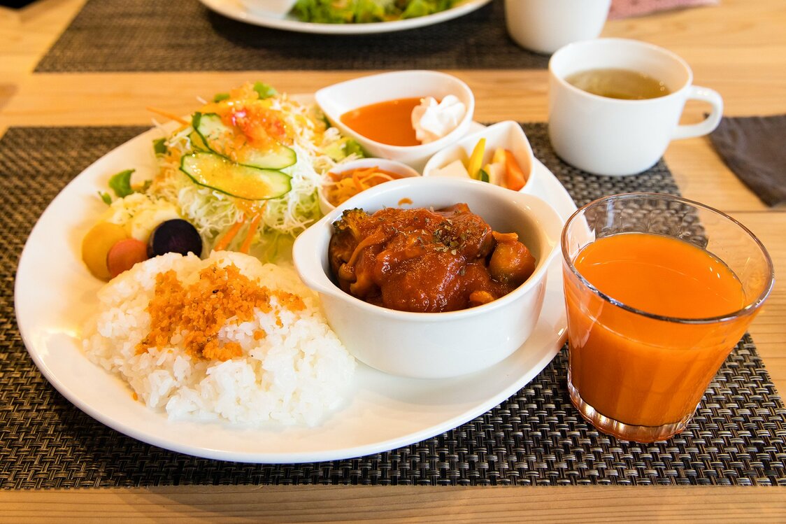 A lunch menu item at Blue Bee is chock-full of carrots and is served with pure, cold-pressed carrot juice.
