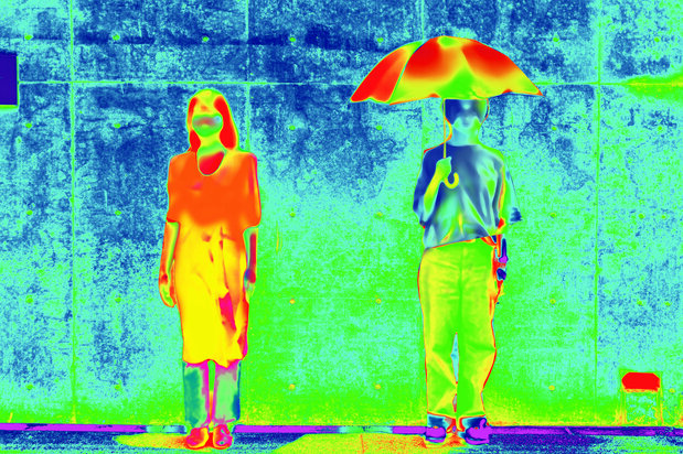 An infrared thermography image shows the temperature difference with and without a parasol. (Courtesy of World Party)