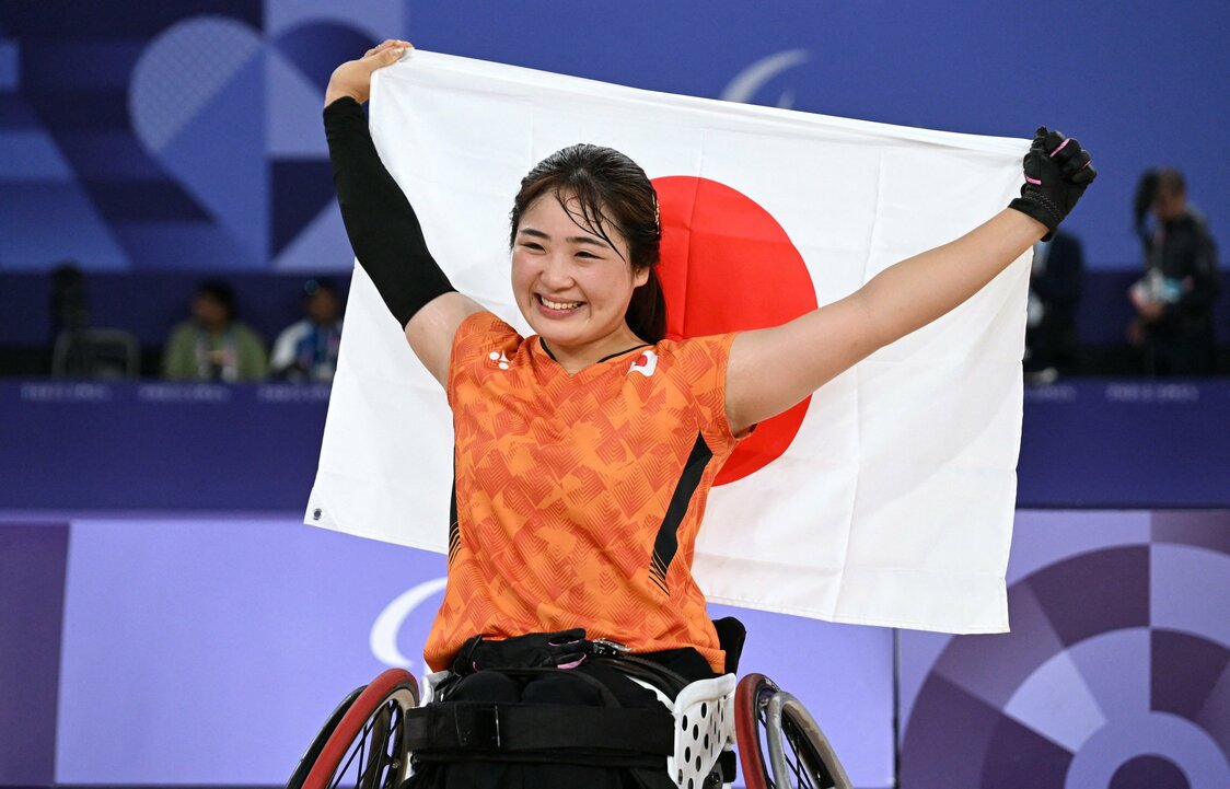 連覇で満面の笑みの里見選手（ロイター）
