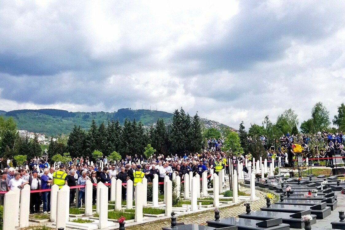 People gather at the cemetery during Osim’s funeral to say their farewells. (Courtesy of the author)