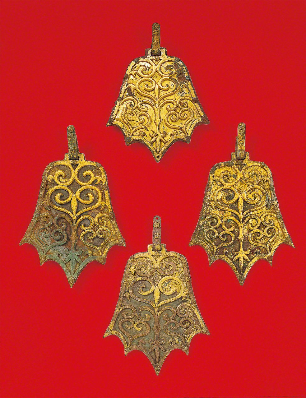 Gilt bronze horse pendants found at Site 7. (Courtesy of Munakata Taisha)