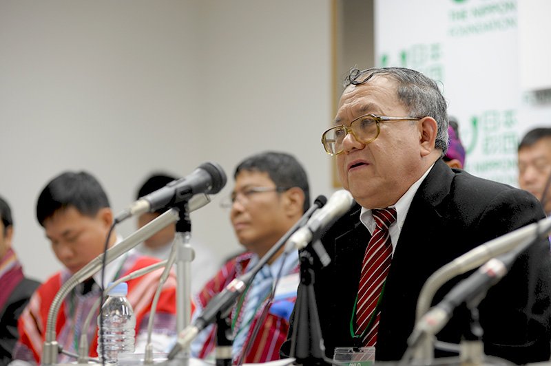 The UNFC delegation head, Colonel Hkun Okker, delivering his remarks at the press conference.