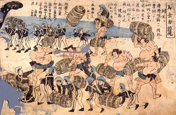 The rikishi depicted in the kawaraban, performing feats of strength. (Courtesy Yokohama Archives of History)
