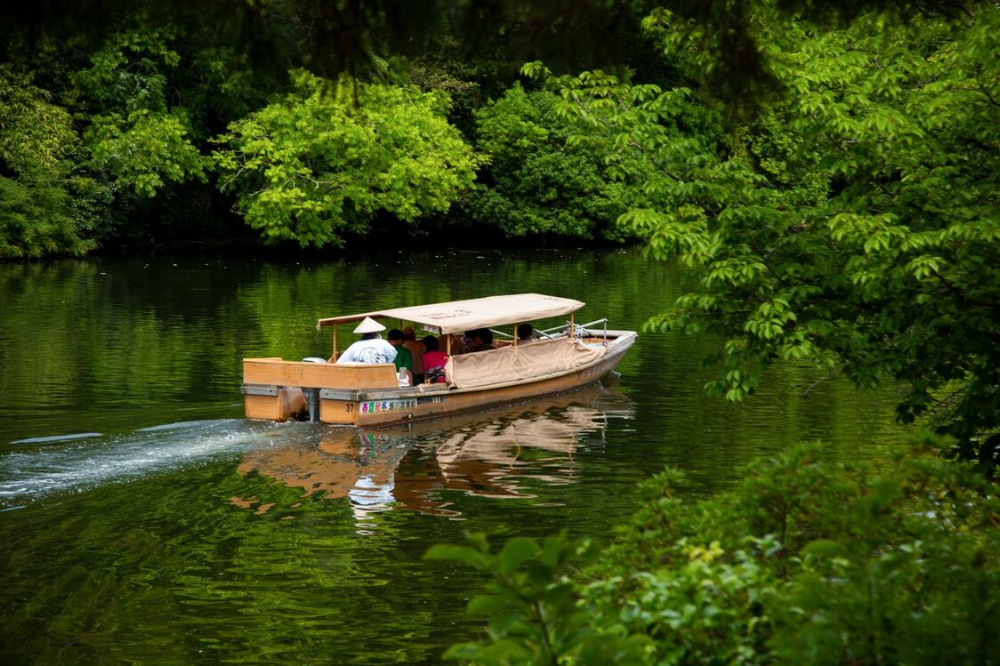 A boat glides along the water.