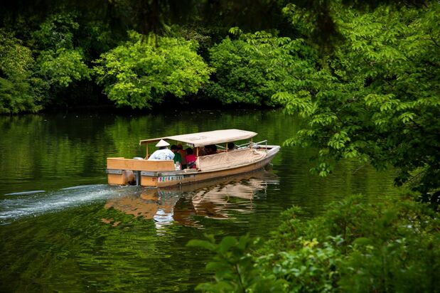 A boat glides along the water.