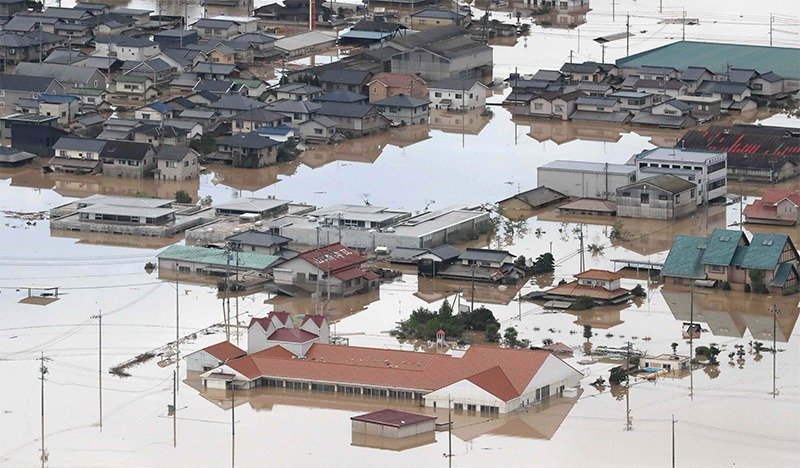 Flooded streets in Kurashiki, Okayama Prefecture, on July 8, 2018. (© Jiji)