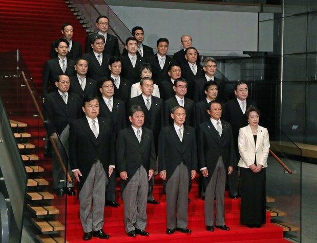 Prime Minister Suga Yoshihide, at front center, poses with his new cabinet on September 16 at the Kantei. (© Jiji)