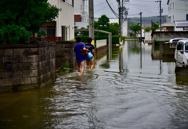 Flooding in Japan after torrential rains. (© Pixta)
