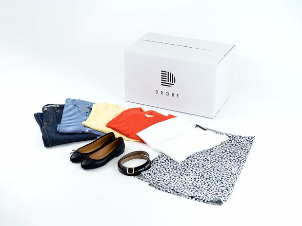 A sample of stylist-selected clothing items in a Drobe courier service box.(Courtesy of Drobe)