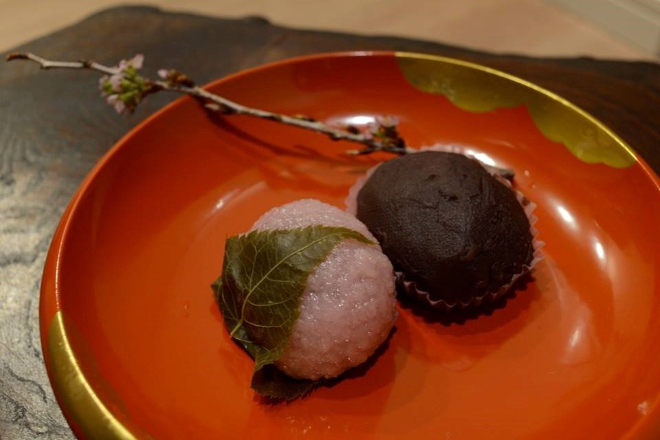 Traditional sweets, sakuramochi (left) and azuki-bean-paste covered botamochi (right).