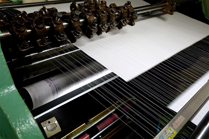 Sheets move through the printing machine.