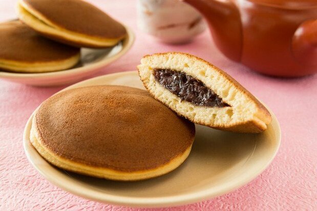 Dorayaki can be enjoyed with a cup of coffee, tea, or even milk.