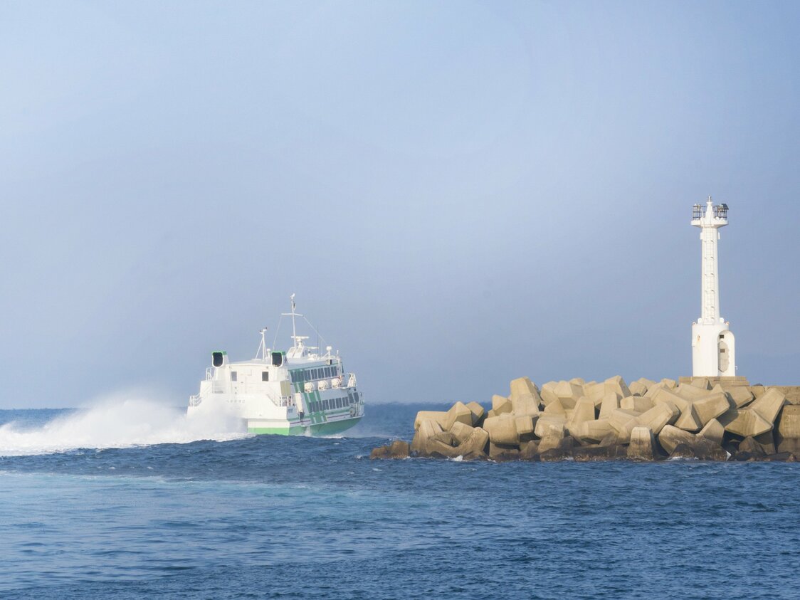 A jetfoil shoots across the water as though it’s flying.