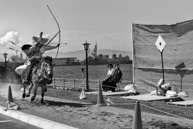 A dazzling female rider takes aim. (2015)