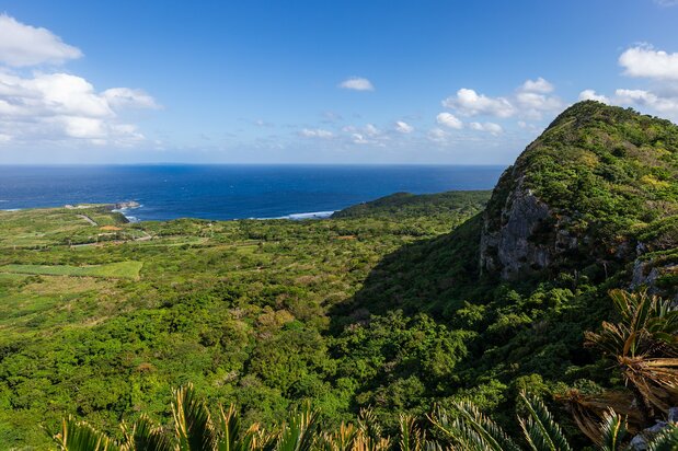 The view from the Churaumi Lookout. The promontory on the right is Mount Iheya, with Cape Hedo in the distance.