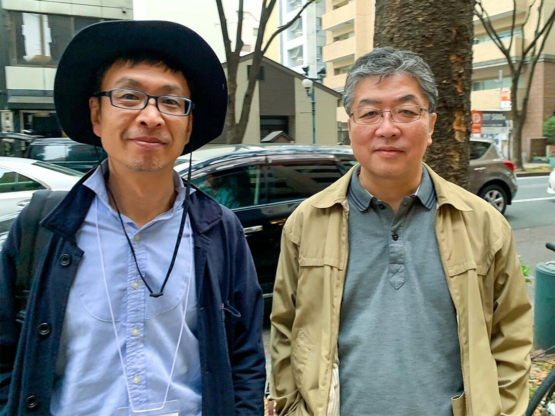 事務局長の藤村興晴さんと、実行委員長で「ブックスキューブリック」店主の大井実さん（筆者撮影）