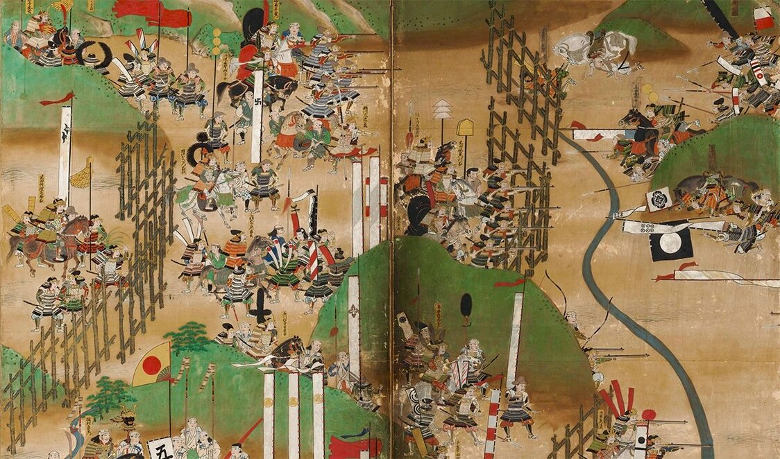 『長篠合戦図屏風』より馬防柵の内側から銃弾を浴びせる織田軍を描いた部分を拡大 / 犬山城白帝文庫所蔵