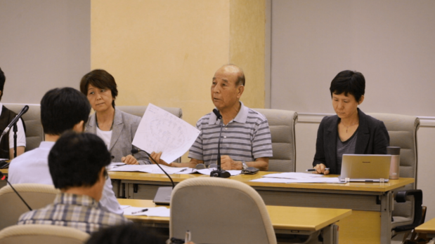 2015年6月22日、都庁記者クラブでの会見で「2度目」の立ち退きについて語る住民 ©Shinya Aoyama