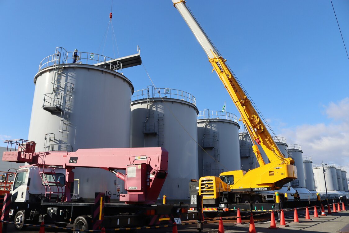 A treated water tank being dismantled at TEPCO’s Fukushima Daiichi Nuclear Power Plant on the morning of February 14, 2025. (Courtesy Tokyo Electric Power Company; © Jiji)