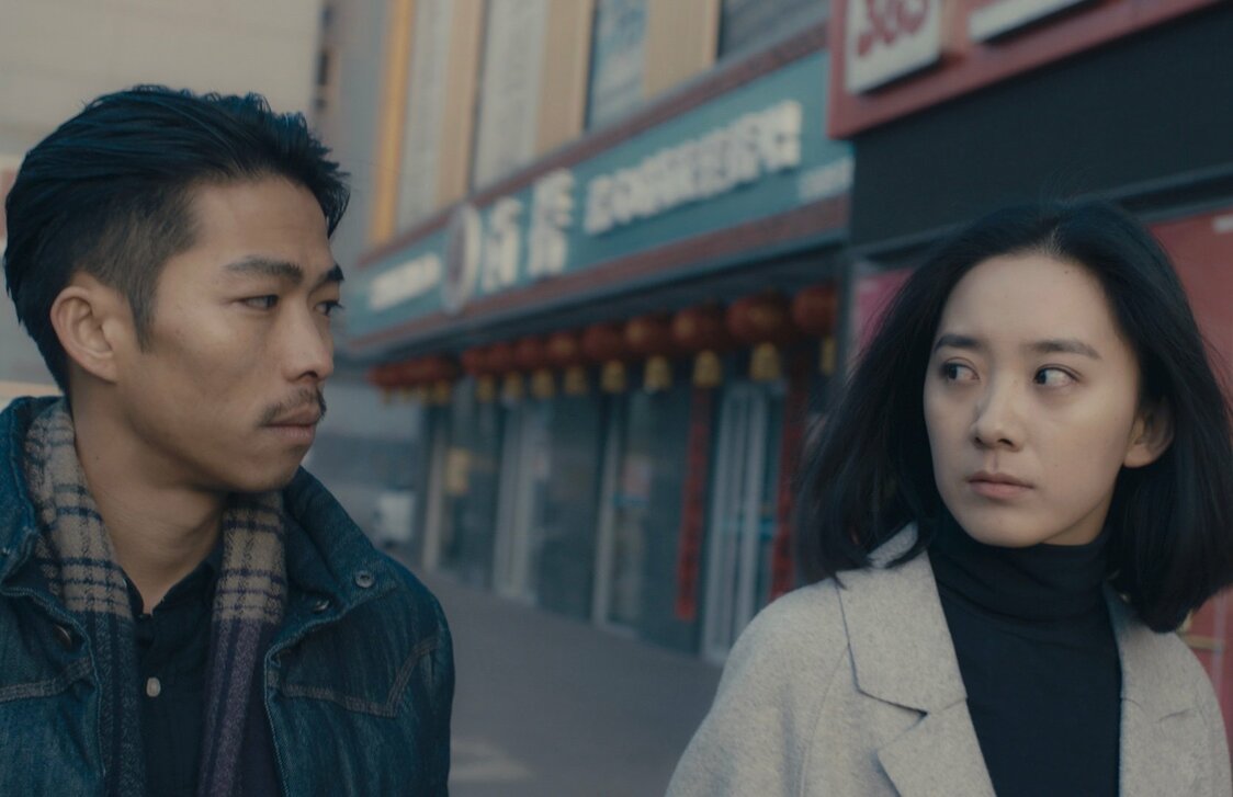 思いを寄せる女性から冷たくされるチェン（チャン・ユー）© Ms. CHU Yanhua and Mr. HU Yongzhen