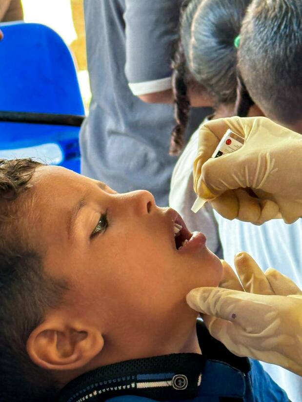Children being vaccinated against polio on September 2, 2024, in Deir al-Balah, Gaza Strip, State of Palestine. (Courtesy Seita Akihiro)