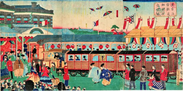 歌川広重(三代)作「東京汐留鉄道御開業祭礼図」(港区立郷土歴史館所蔵)鉄道開業式での光景。ホームを提灯で飾り付けるアイデアは鉄道頭・井上勝の考案で、以降の鉄道開業・開通式での習わしとなった