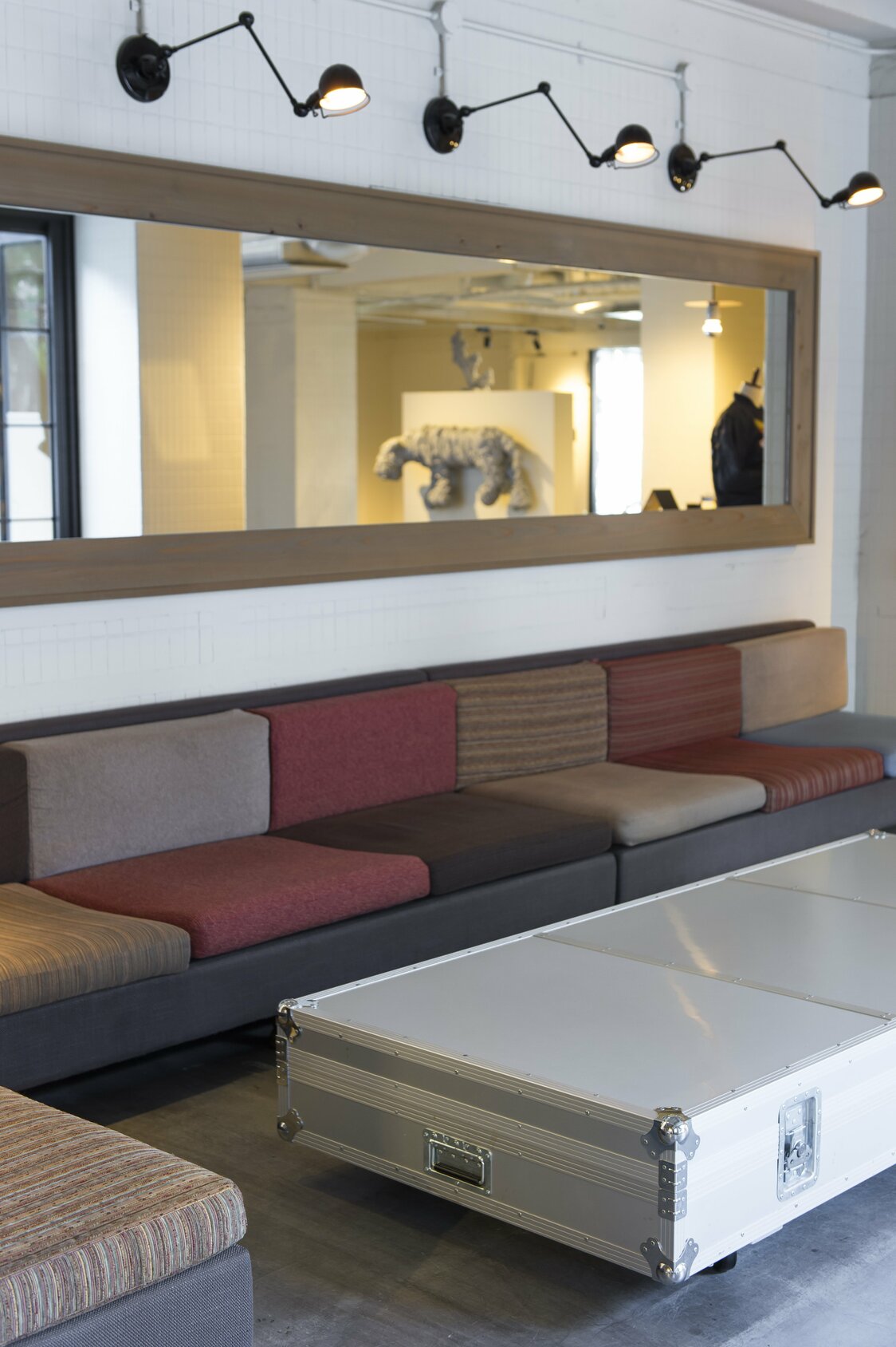 The stylish lobby features a table made of duralumin cases.