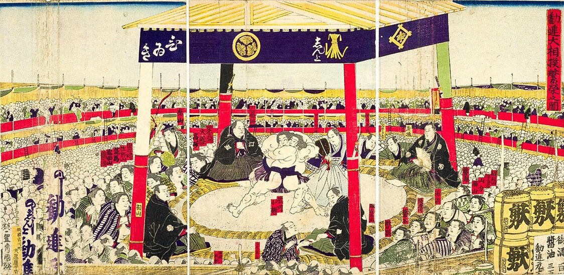 La salle est pleine à craquer du premier rang jusqu’au deuxième balcon. Cette estampe en couleur (nishiki-e) témoigne bien de la popularité du sumo. « »Le succès du kanjin-zumô« » (Kanjin-zumô han’ei no zu). (Collections de la bibliothèque de la Diète nationale)