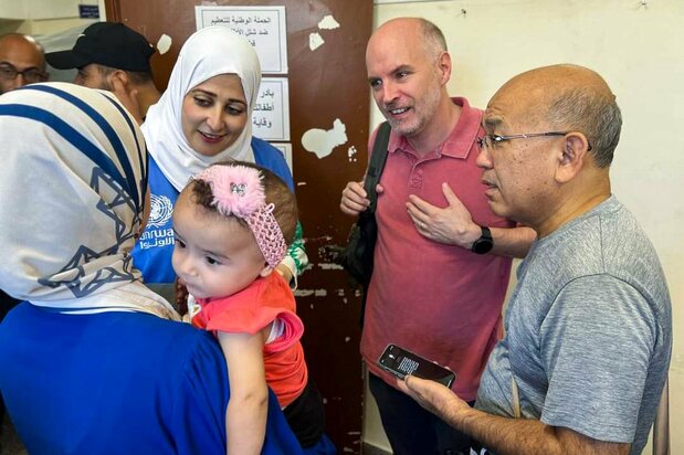 UNRWA Health Department director Seita Akihiro (far right) observes the vaccination of children against polio on September 1, 2024, Nuseirat, Gaza. (Courtesy Seita Akihiro)