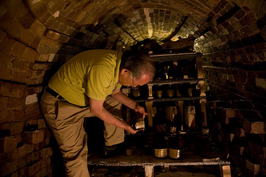 Isezaki enters the kiln after it has cooled down to check his creations.
