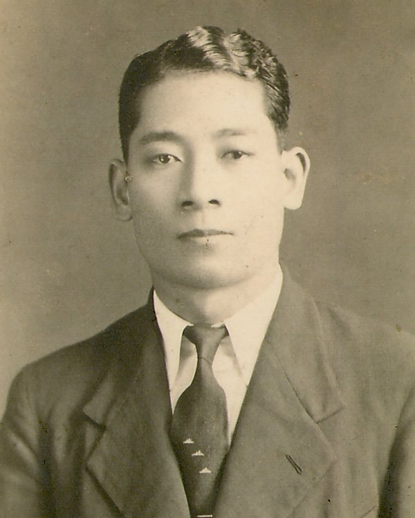 Andō in the 1930s. After graduating from high school, he worked briefly as a librarian before becoming an entrepreneur.