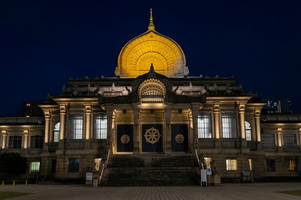 Tsukiji Honganji lit up at night.