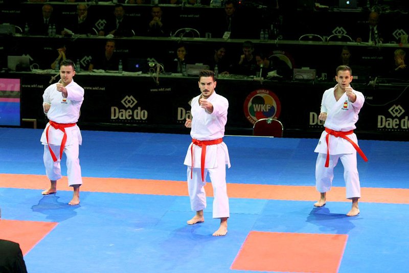 Spanish karateka participating in a group kata event.