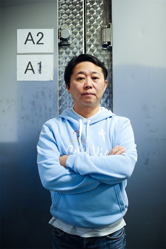 Wadakyū president Wada Sachiyuki, wearing a parka bearing the name of Certa Viga, the popular local soccer club.