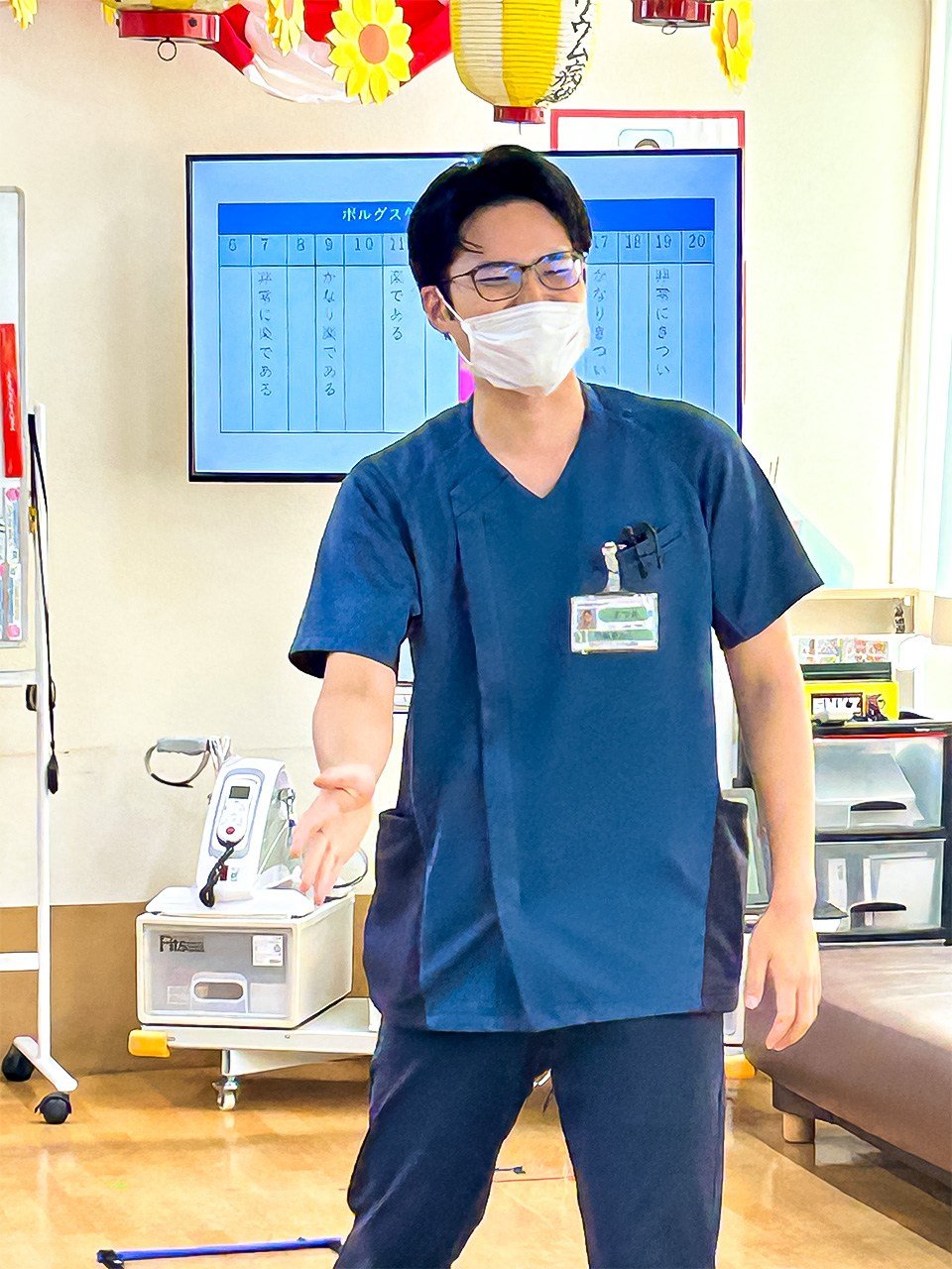 在ASMO指导学员训练的作业治疗师松尾亮佑