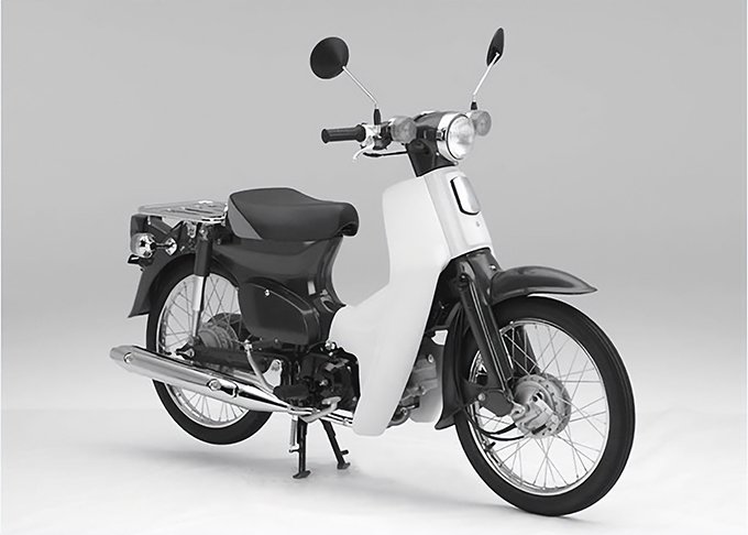 دراجة هوندا ”سوبر كاب (Super Cub)“ (رقم التسجيل 5674666) التي يمكن رؤيتها وهي تسير في الطرقات حول العالم، الصورة مقدمة من: منصة معلومات براءات الاختراع ”J-PlatPat“