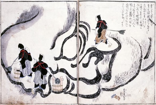 Le visage de Daruma se précise. Illustration tirée de l’ouvrage d’Enkōan intitulé « Description illustrée de Hokusai peignant sur le vif sa grande œuvre » (Hokusai taiga sokusho saizu). (Avec l’aimable autorisation du Musée municipal de Nagoya)