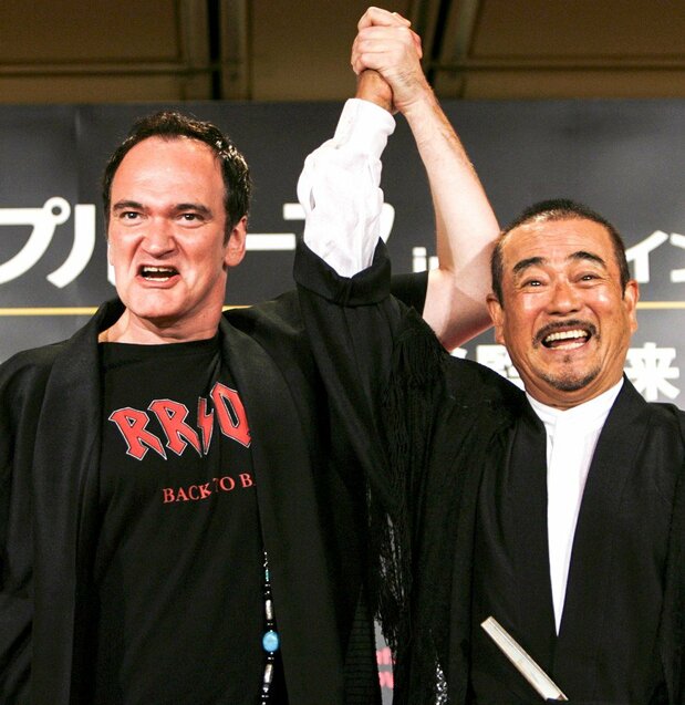 Tarantino (left) and Chiba display their mutual admiration at a press conference in Tokyo on August 2, 2007. (© Reuters)